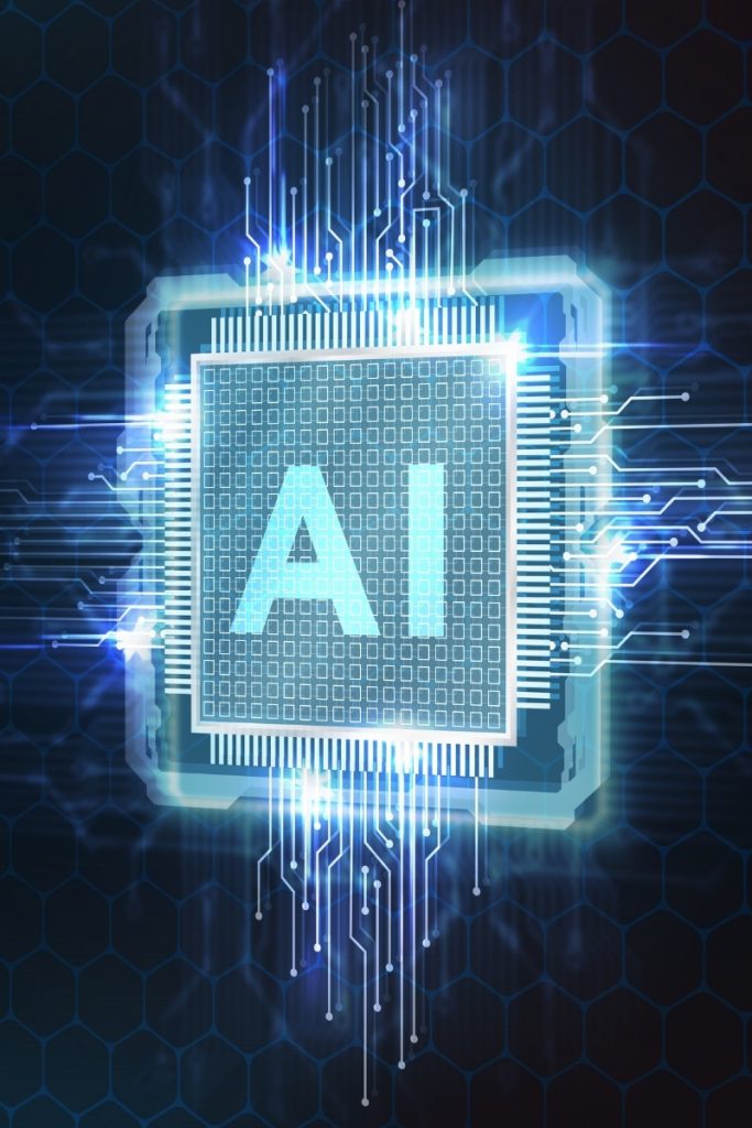 Illuminated circuit board chip labeled AI representing Trumbull AI solutions