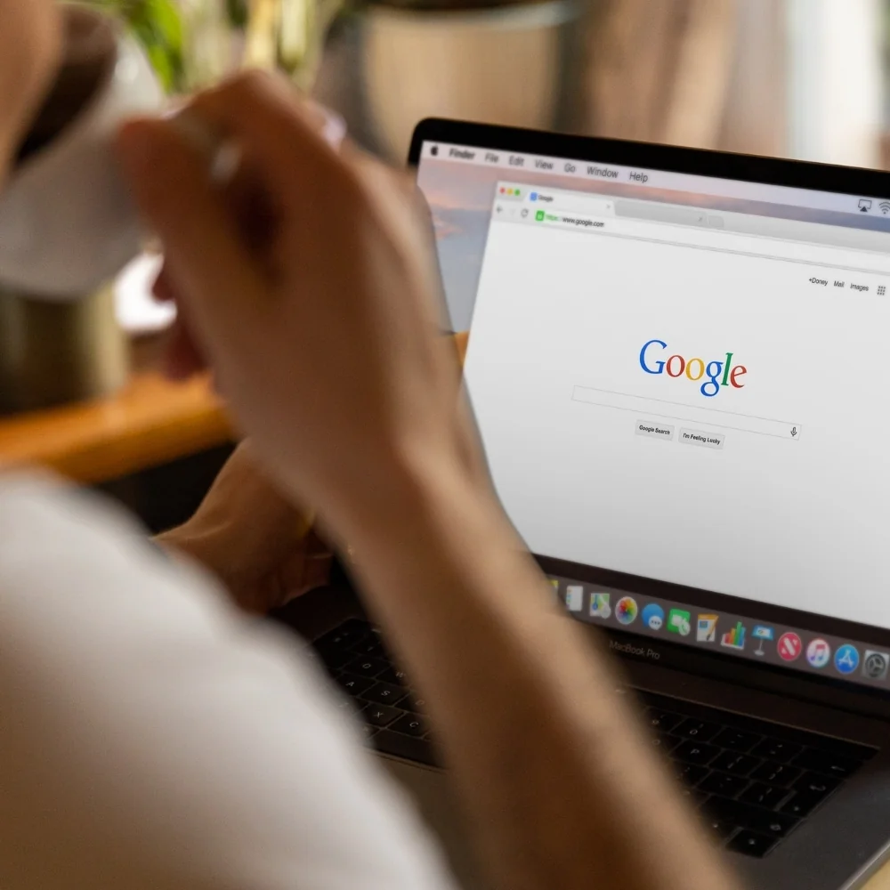 Person reviews a search results page on a laptop for Trumbull SEO research